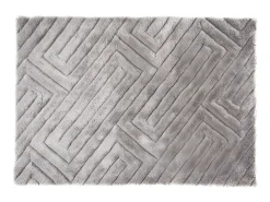 Conjunto mesa de centro con tablero pivotante transparente JOLINE y alfombra shaggy gris MAZE