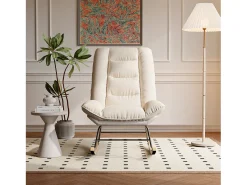 Mecedora ergonómica con cojín beige y estructura gris, diseño moderno en tela/piel sintética.