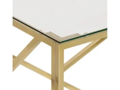 Mesa de centro dorada en acero inoxidable y cristal templado.