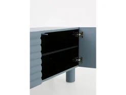 Mueble tv beige con relieve ondulado en las puertas