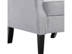Sillón de tela gris claro