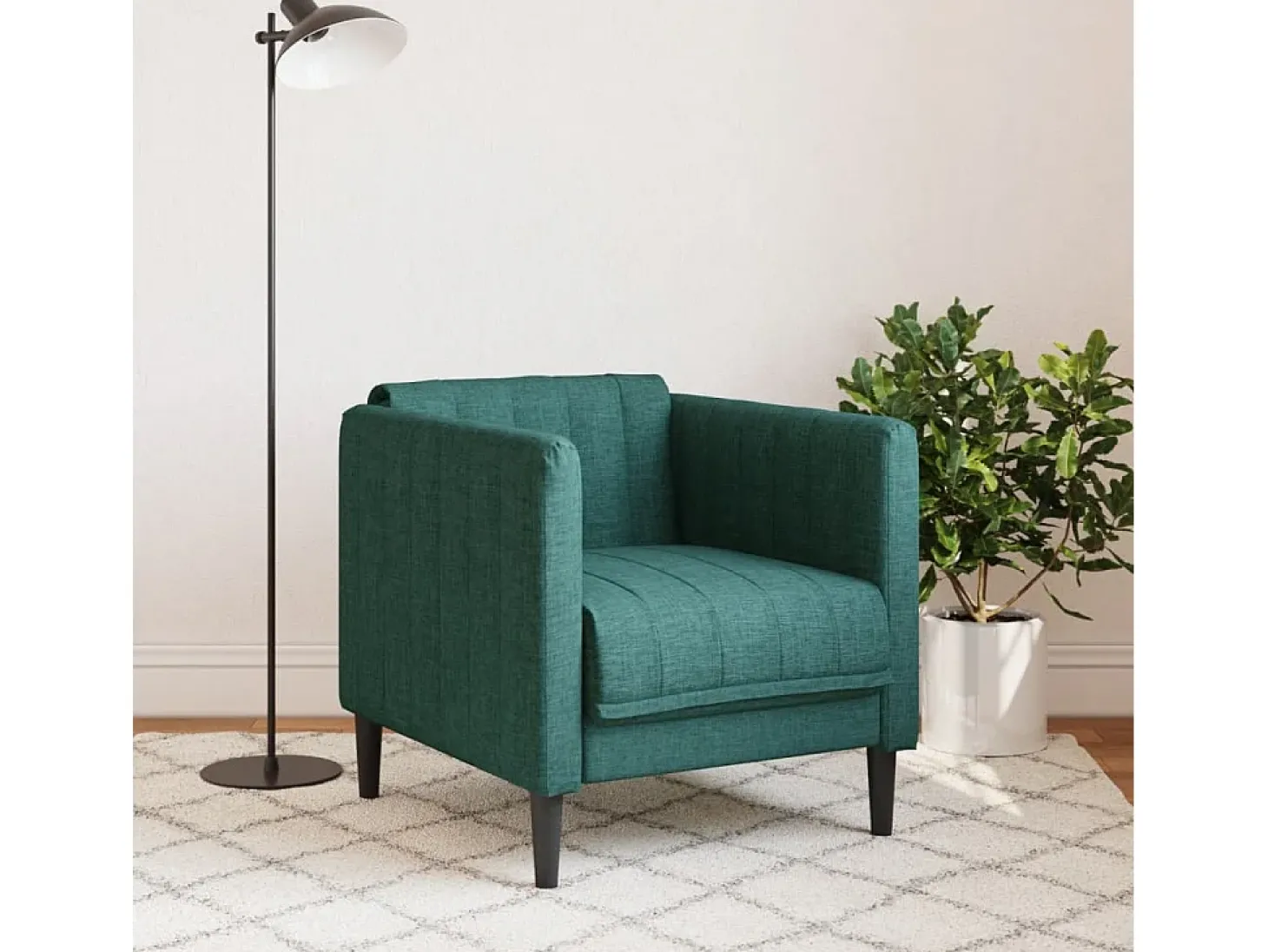 Sillón de tela verde oscuro