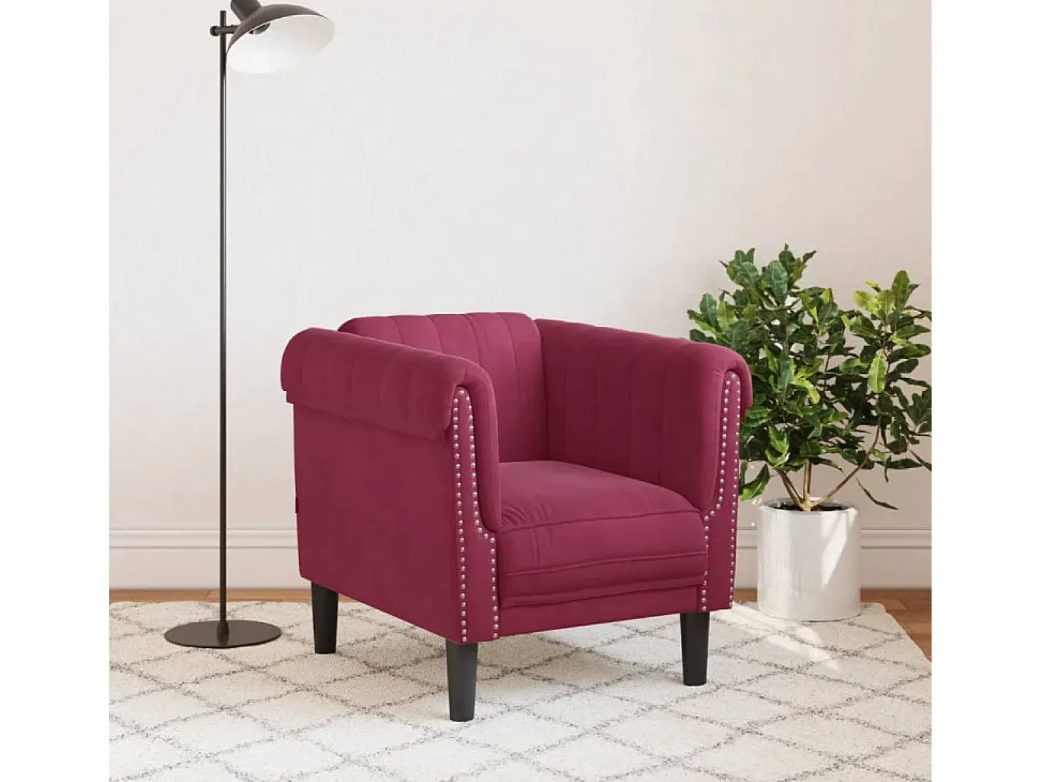 Sillón de terciopelo rojo tinto