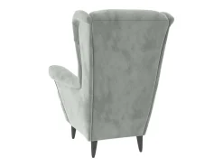 Sillón orejero y taburete de terciopelo gris claro