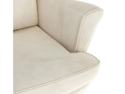 Sillón orejero y taburete de terciopelo crema