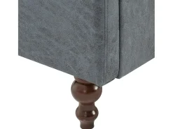 Sillón tapizado de tela gris