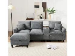 Sofá moderno de 4 plazas con reposapiés con almacenaje, 2 portavasos y puerto USB. Medidas: 229 x 149,5 x 83 cm. Tapizado en terciopelo gris.